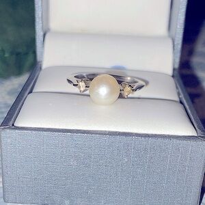 Vintage 14k white gold, White Pearl Ring .06 carat diamonds.